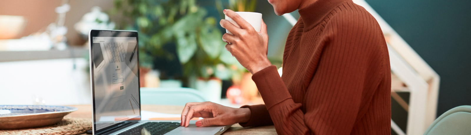 Woman in cafe on computer